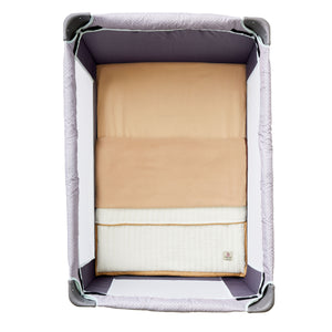 Beige KozySak Portable Crib Bedding System