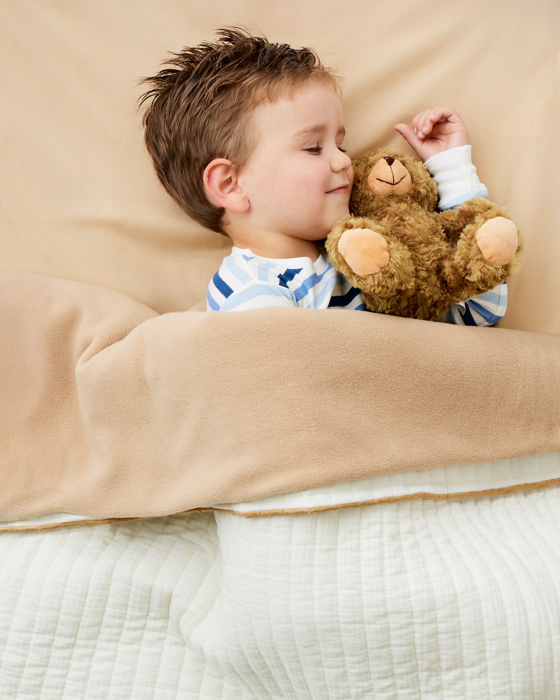 Beige KozySak Portable Crib Bedding System