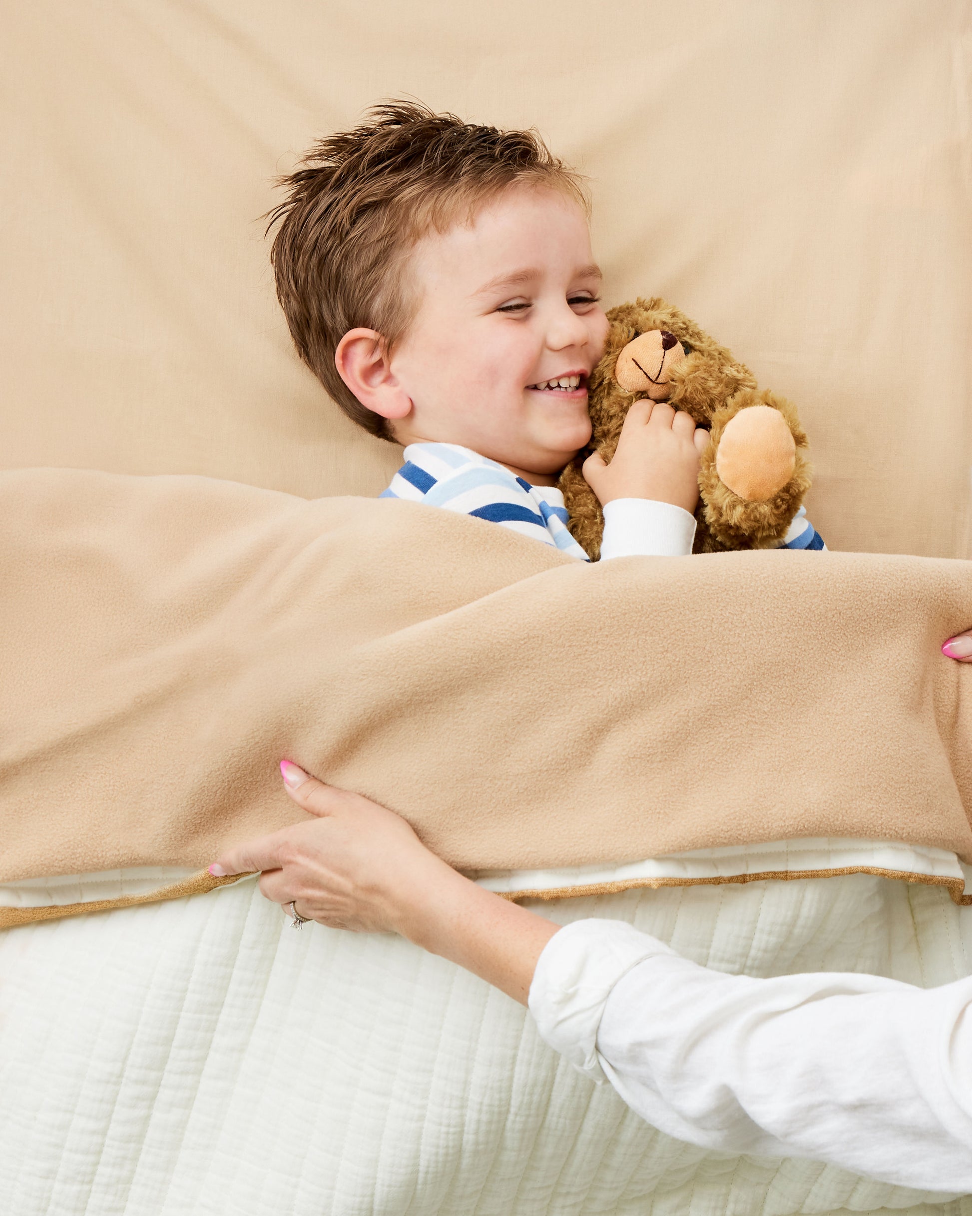 Beige KozySak Portable Crib Bedding System